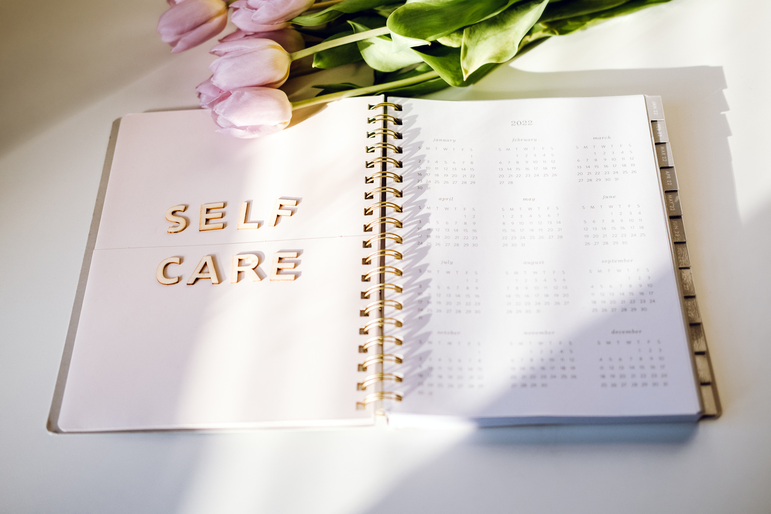 Self Care, wellbeing concept with open notebook, Self care w